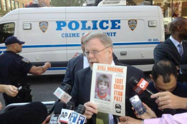 NYPD spokesman Paul Browne holding the original Etan Patz missing poster